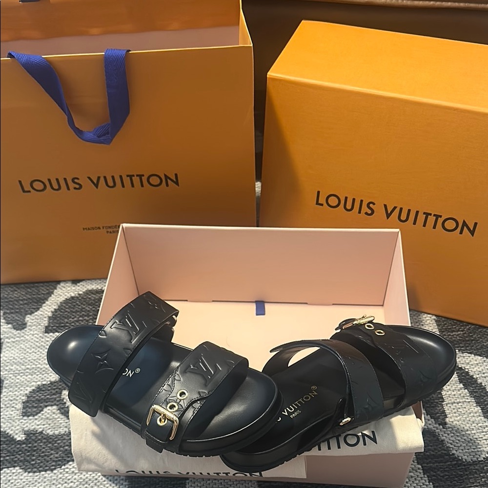 Louis Vuitton “Bom Dia” Black Sandals with Gold Details